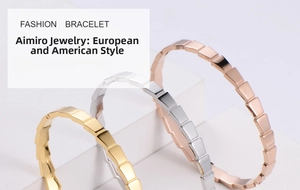 Close-up of elegant scale-shaped segment bracelet in gold, silver and rose gold finishes