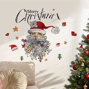 Sticker mural de Noël avec le Père Noël et texte Joyeux Noël dans un salon chaleureux