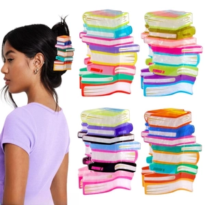 Macro detail of colorful stack-of-books hair claw clips showing premium acetate texture