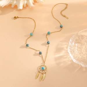 Gold dreamcatcher necklace with turquoise beads and three hanging feather pendants
