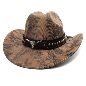 Distressed brown western cowboy hat with silver bull head buckle and metal rivets