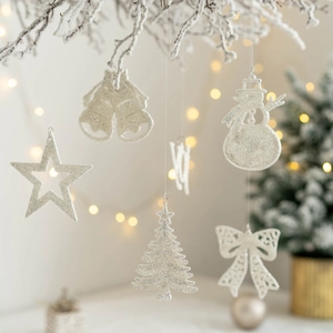 Glittery silver Christmas tree hanging ornaments set with snowflake and bell shapes