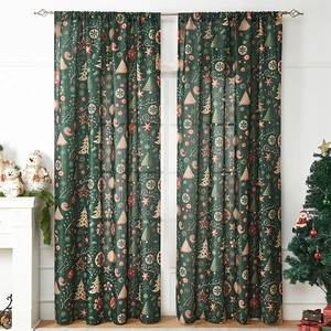 Detail of dark green Christmas curtain with holiday tree and snowflake prints