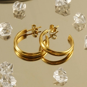 Minimalist 18k gold plated stainless steel hoop earrings with matte finish on golden mirror