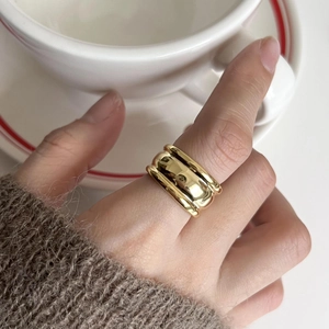 Elegant 925 sterling silver gold wide wave ring with a polished minimalist aesthetic