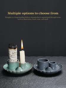 Ceramic palo santo holder in green and grey glaze with leaf-shaped base for incense and candles