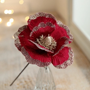 18cm deep red velvet Christmas magnolia flower with glitter edges in a glass vase
