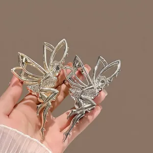 Elegant angel-shaped hair claws in gold and silver finish with sparkling rhinestones