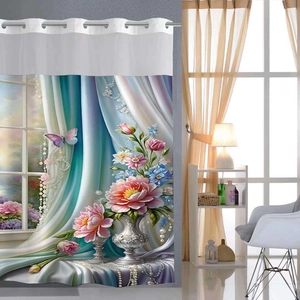 Detail of floral printed shower curtain with silver metal rings and waterproof polyester fabric