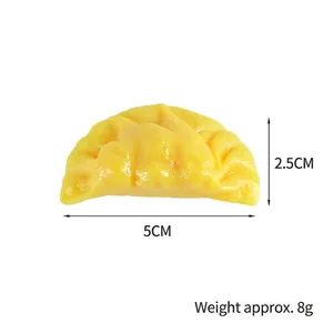 Realistic artificial dumpling food model toy for display props, size 5cm by 2.5cm