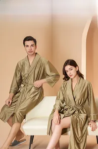 Detail of premium striped bathrobe showing contrast piping and textured fabric surface