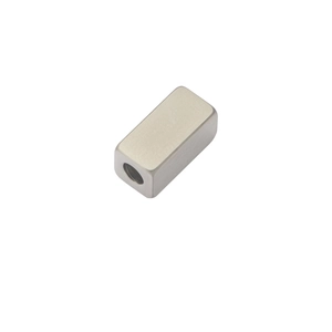 Macro view of a brushed silver square metal bead with internal threading for DIY jewelry