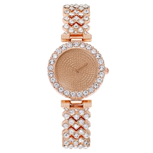 Elegant rose gold women's watch with full diamond encrusted bezel and crystal bracelet