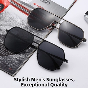 Detail of classic aviator sunglasses with dual metal bridge and grey polarized lenses