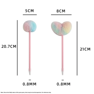 Detail of 0.8mm ballpoint pen featuring rainbow pom-pom and heart plush decorations
