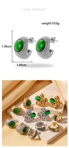 Detail showing C-shaped vintage earrings with emerald zircon and measurements of 1.96cm