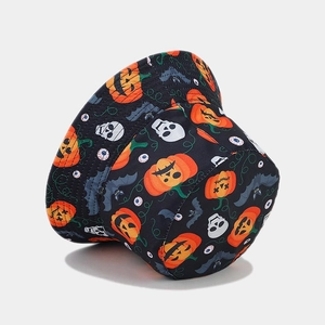 Reversible bucket hat with black Halloween pumpkin and skull prints for parties