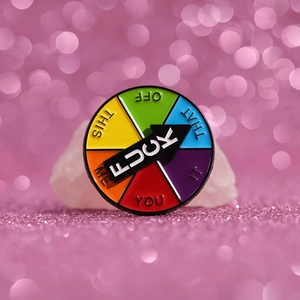 Creative spinning arrow enamel brooch with colorful phrases on a white stone base