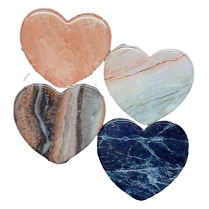 Heart-shaped marble phone grip set with four patterns including orange and blue veins