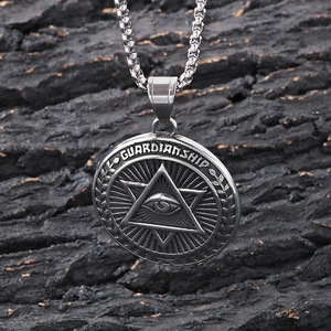 Detail of Eye of Providence necklace with Guardianship engraving on silver round pendant