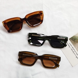 Stylish square cat eye sunglasses in amber, black and dark tea colors with metal accents