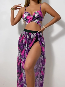 Detail of pink tropical leaf print bikini top and high-slit long mesh beach skirt