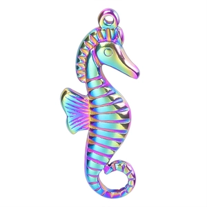 Detailed macro view of seahorse pendant accessory with rainbow gradient plating