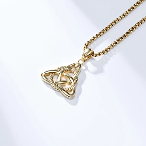Detail of gold Viking Triquetra and double snake pendant with steel box chain