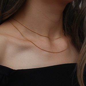 Minimalist double-layered gold snake chain necklace for women on neck display