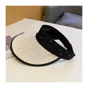Detail of white woven sun visor with rhinestones and internal size label 54-58cm