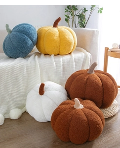 Plush pumpkin pillows in various colors and sizes for a cozy Nordic home interior