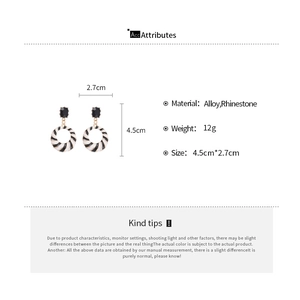 Detailed view of striped enamel earrings with black rhinestones and dimension specs