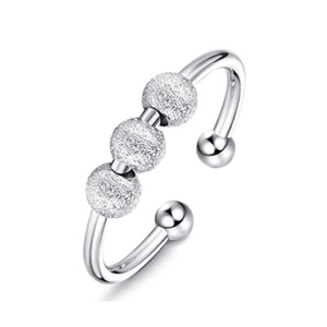 Polished stainless steel spinning bead anxiety ring with three frosted movable beads