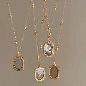 French retro gold rose pendant necklace with embossed flower design and delicate chain