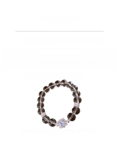 Close-up of beaded flower bracelet with dark grey crystals and zircon square centerpiece