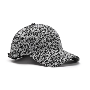 Classic baseball cap featuring black and white leopard pattern in a jacquard weave texture