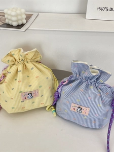 Drawstring crossbody bag with yellow and blue plaid patterns and cute panda patches