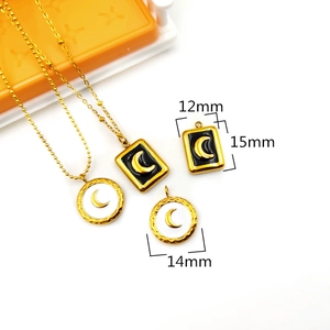 Detailed view of 18K gold plated oval and rectangle enamel pendants with crescent moon