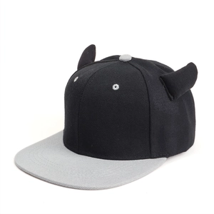 Detail of a black hip-hop cap with unique 3D devil horns and grey contrast flat brim