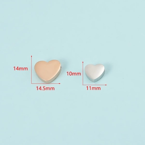 Polished stainless steel heart beads in rose gold and silver finish with size markings
