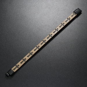 Close-up of beige braided leather bracelet with cross pattern and black magnetic clasp