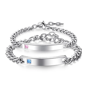 Couple's stainless steel cuban chain bracelets with pink and blue crystal nameplates