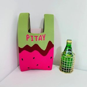Detailed view of the vibrant pitaya fruit theme knit tote bag with clear stitch texture