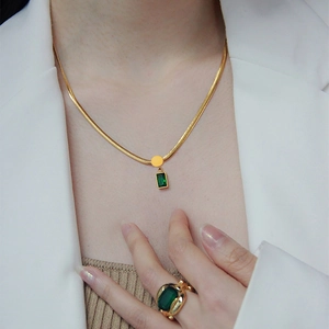 French retro 18K gold stainless steel snake chain necklace with green zircon pendant