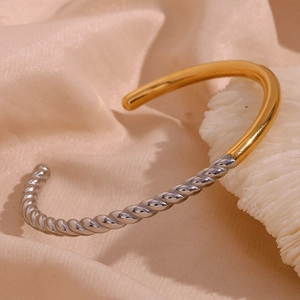 Two-tone twisted cable open bangle in 18K gold plated stainless steel for women