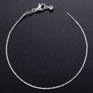 Elegant silver snake chain necklace with lobster clasp and bead pendant on black texture