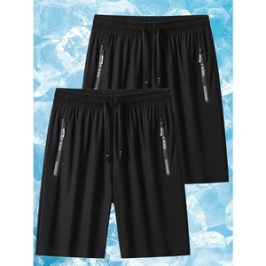 Men's quick-dry sports shorts set with elastic drawstring waist on cooling ice background