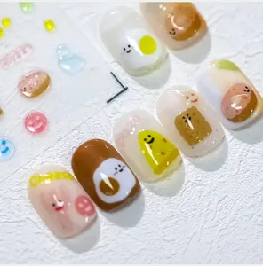 Macro detail of M-142 3D nail art stickers featuring cute cartoon food and cheese icons