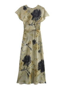 Detail of waist twist knot design on champagne floral print satin long dress