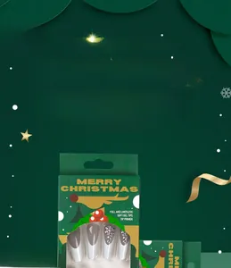 Coffret d'ongles de Noël festifs avec paillettes et flocons de neige sur fond vert